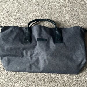John Varvatos duffle bag.